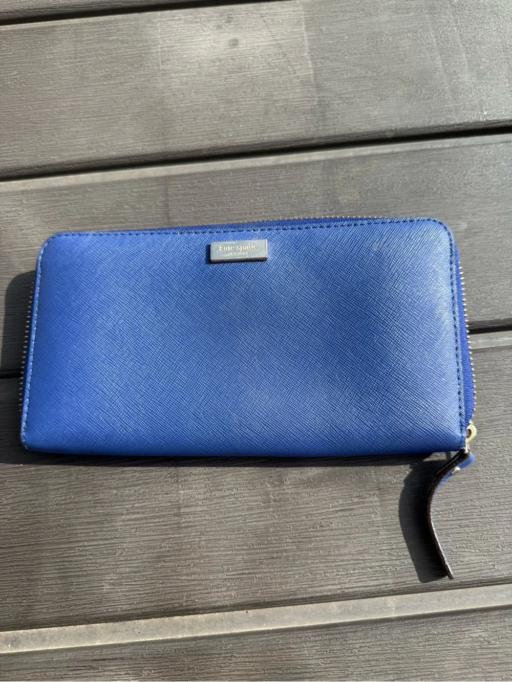 kate spade zip-around wallet in cobalt blue